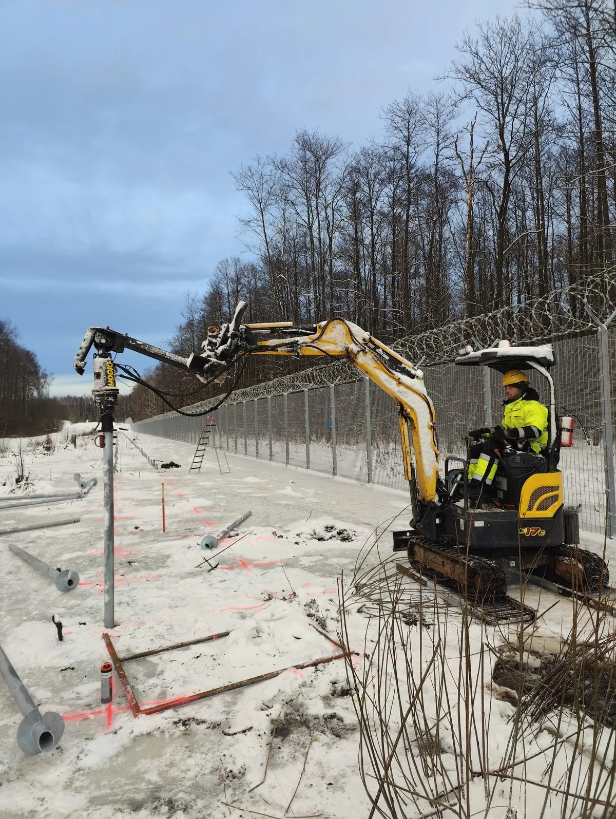Installation crew on site with piling equipment