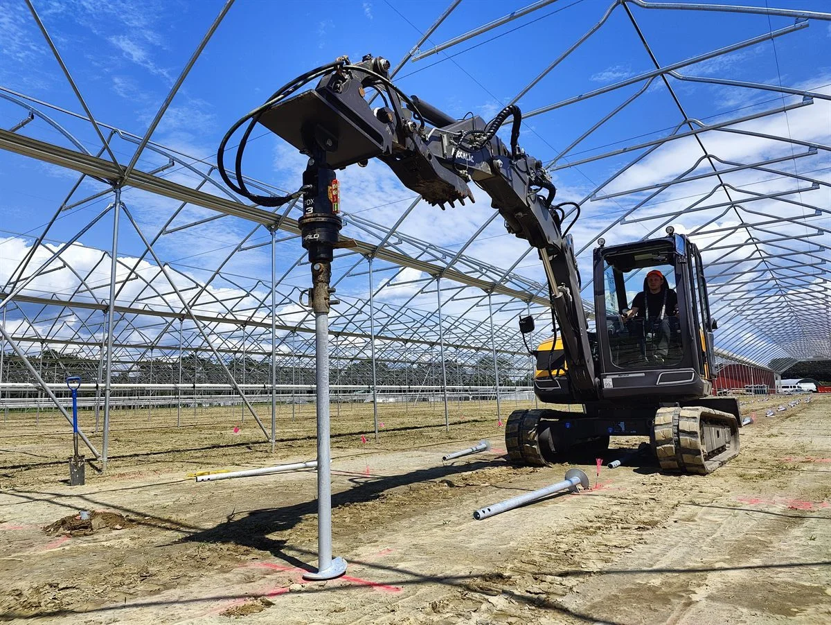 Handheld screw pile installation